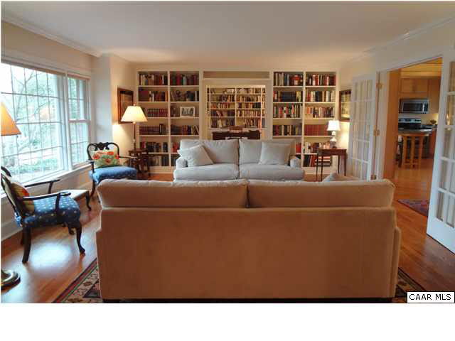 1436 Grove Road Charlottesville, VA 22901 - Photo 2 of 25 Handsome built-in bookcases. View from front hall looking into diining room / library.