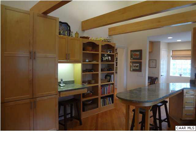 1436 Grove Road Charlottesville, VA 22901 - Photo 9 of 25 Bookcases, built-in desk & pantry.