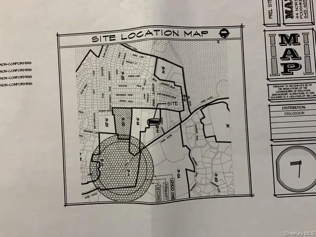 a picture of a door and a white rack on the wall