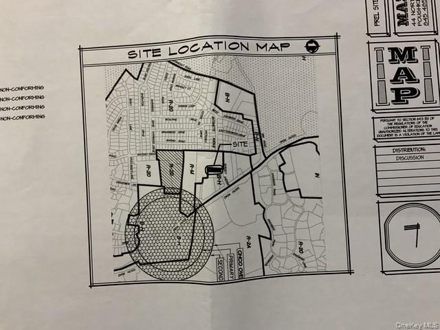 2343 South Road Poughkeepsie, NY 12601 - Photo 2 of 3 a picture of a door and a white rack on the wall