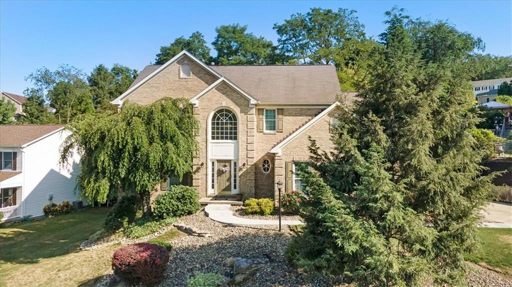 141 Field Club Circle McKees Rocks, PA 15136 - Photo 1 of 25 a aerial view of a house with a yard and potted plants