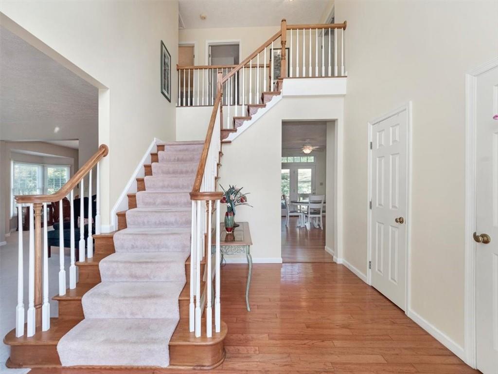 141 Field Club Circle McKees Rocks, PA 15136 - Photo 8 of 25 a view of entryway and hall with wooden floor