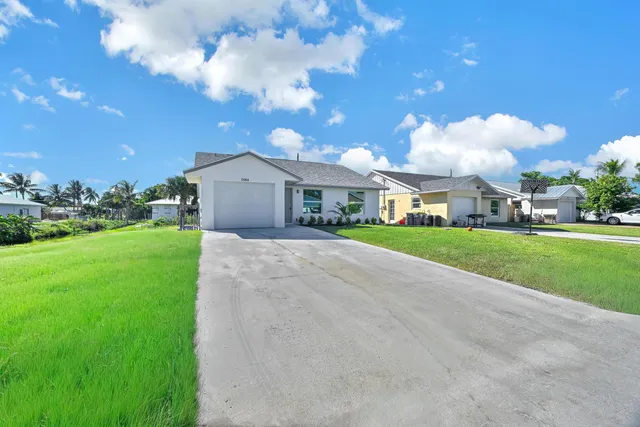 $359,900 | 5584 Southeast Katharine Avenue, Stuart, FL 34997