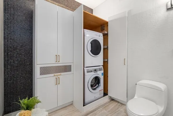a utility room with dryer and washer