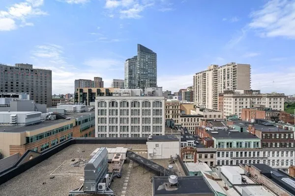 a view of city with tall buildings