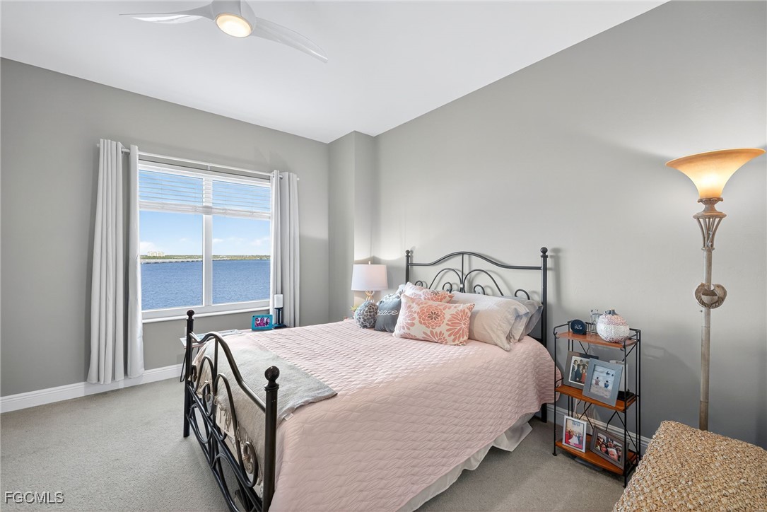 2743 First Street, Unit 701 Fort Myers, FL 33916 - Photo 21 of 31 a bedroom with a bed and a window