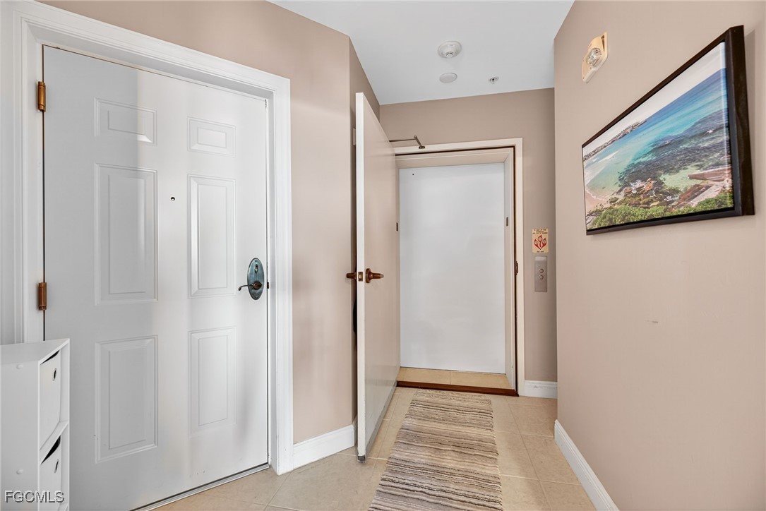 2743 First Street, Unit 701 Fort Myers, FL 33916 - Photo 10 of 31 a view of a hallway with wooden floor