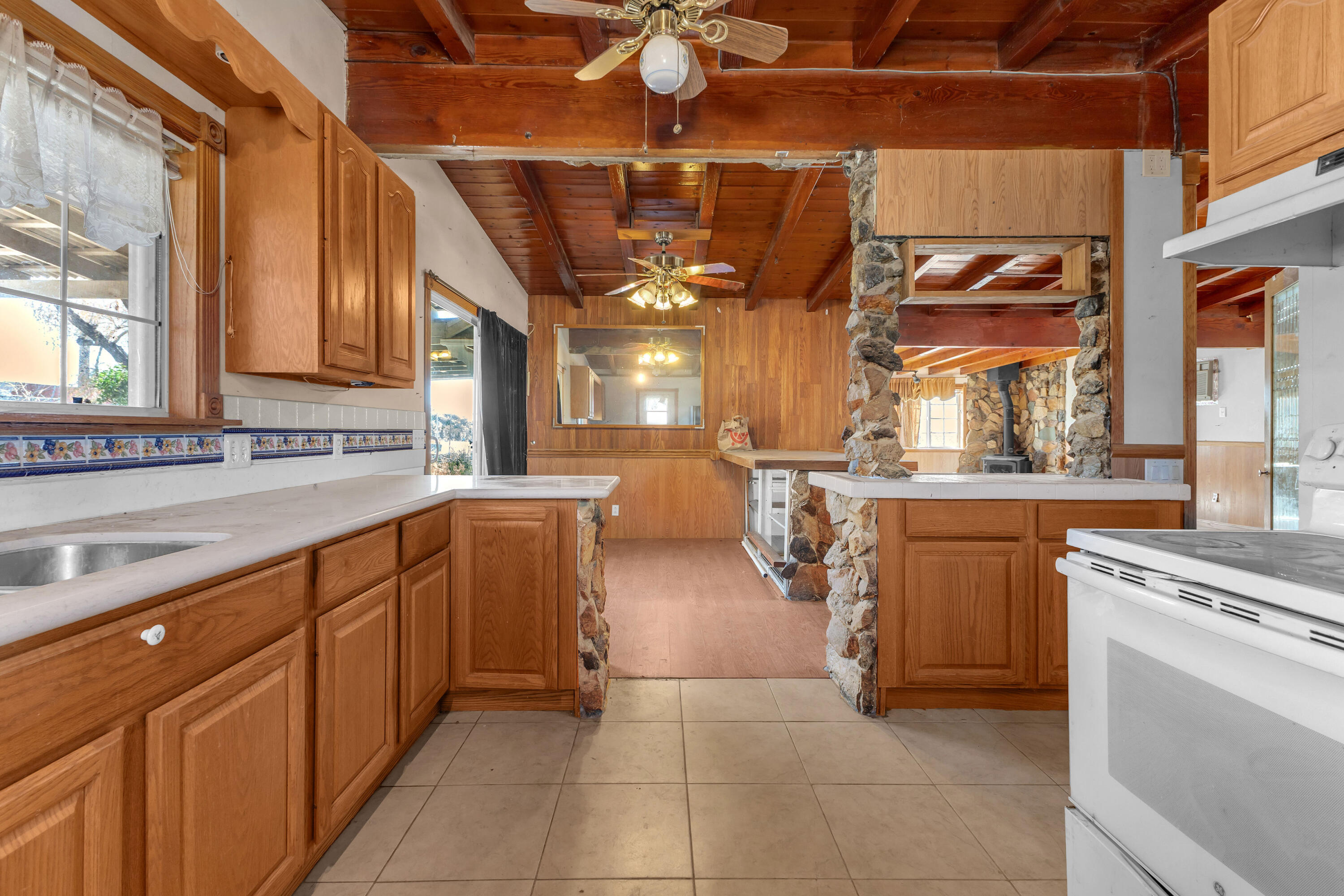 81975 Dillon Road Desert Hot Springs, CA 92241 - Photo 1 of 51 a kitchen with stainless steel appliances granite countertop a sink and cabinets