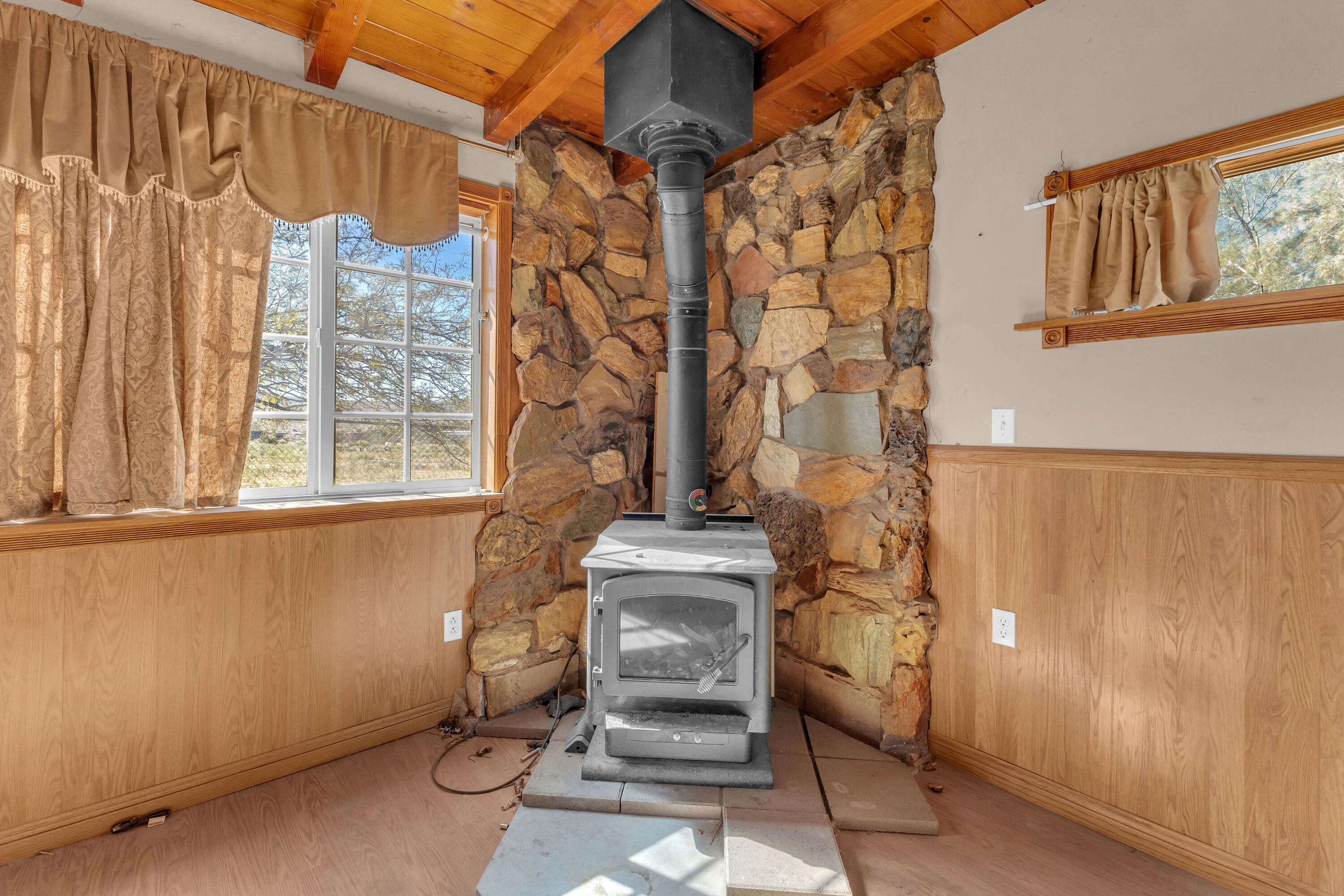81975 Dillon Road Desert Hot Springs, CA 92241 - Photo 15 of 51 a bathroom with a granite countertop sink and a shower curtain
