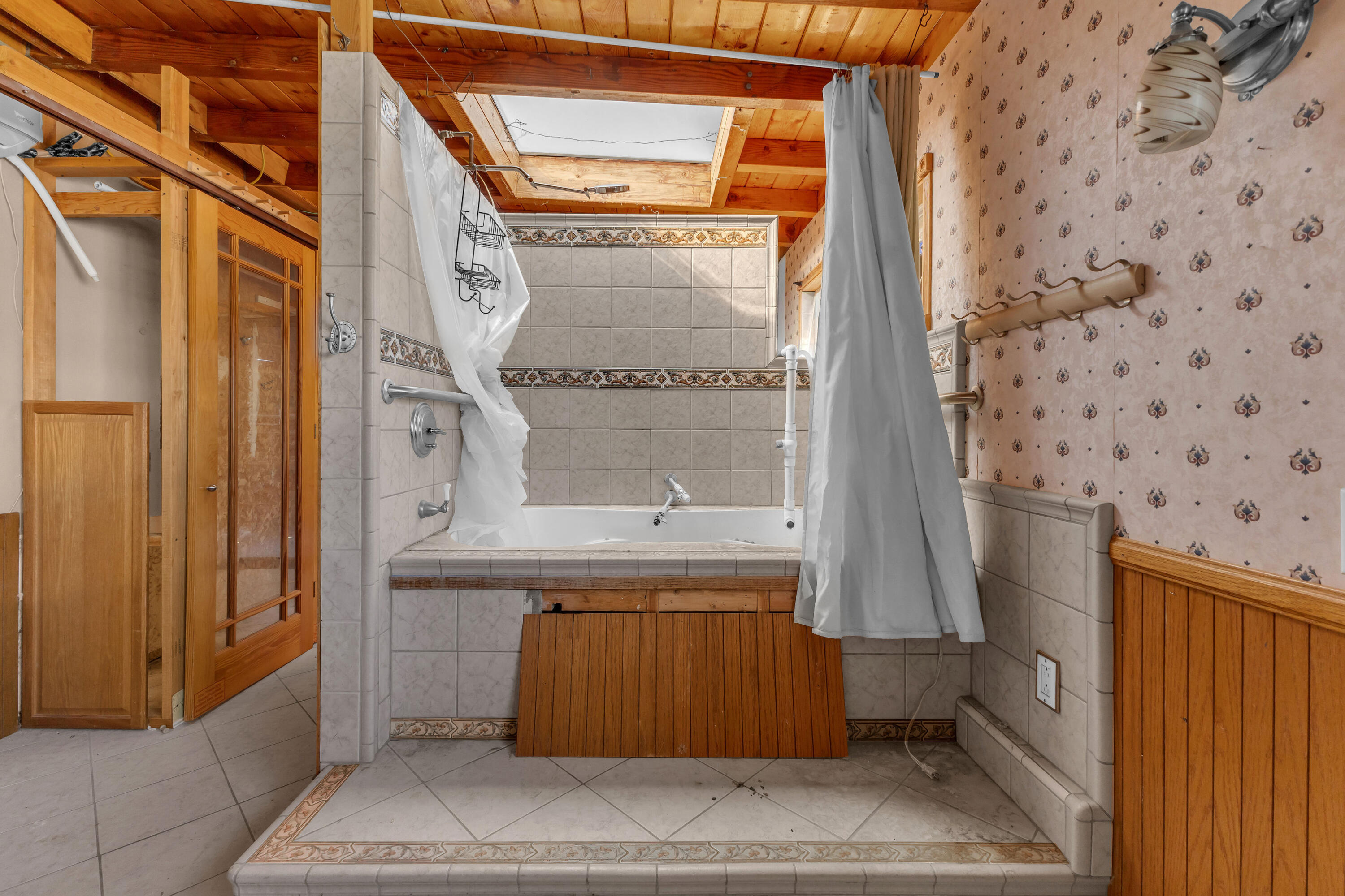 81975 Dillon Road Desert Hot Springs, CA 92241 - Photo 27 of 51 a bathroom with a window and shower
