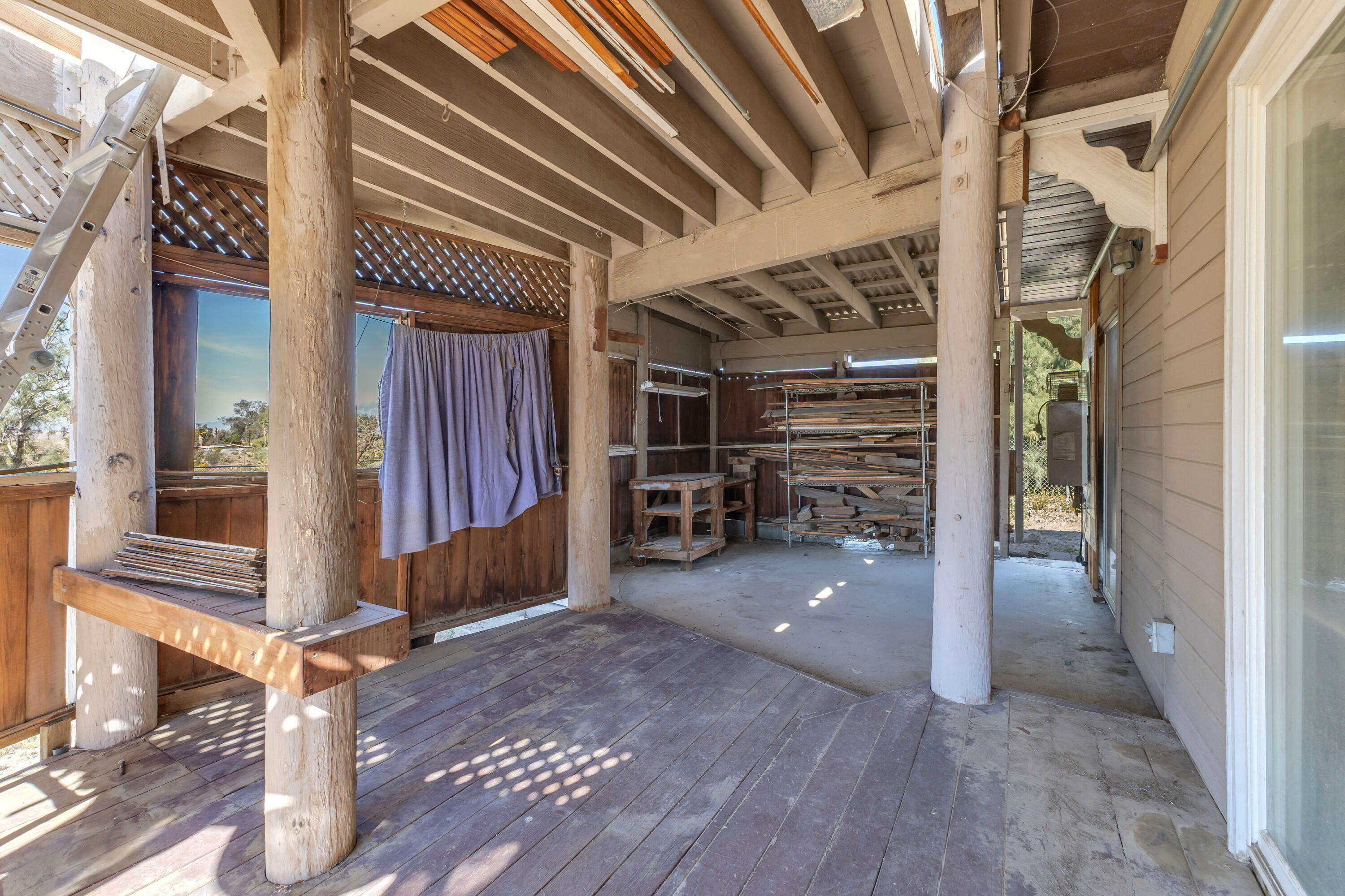 81975 Dillon Road Desert Hot Springs, CA 92241 - Photo 31 of 51 a view of an front door and livingroom
