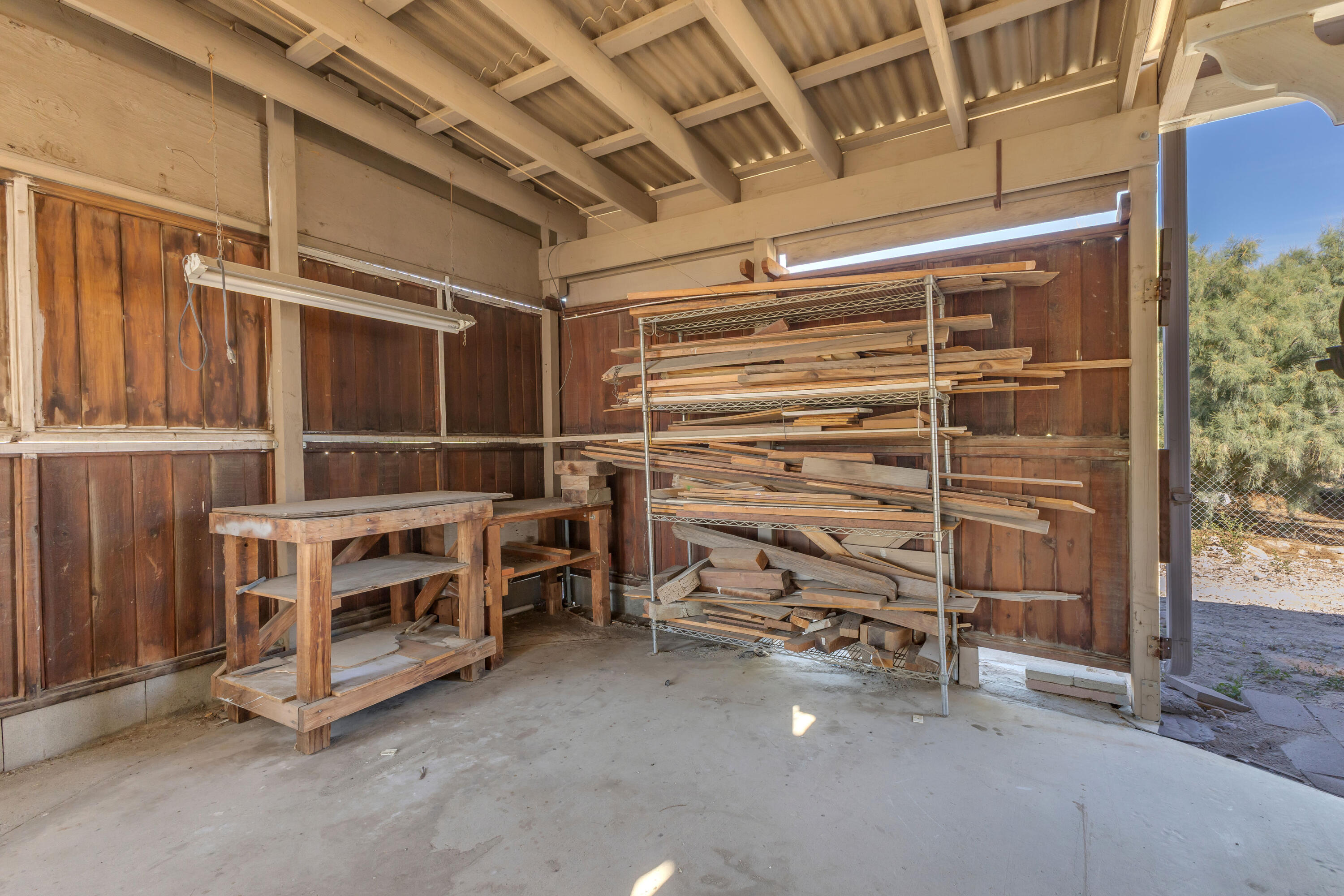 81975 Dillon Road Desert Hot Springs, CA 92241 - Photo 32 of 51 a view of an empty room with storage