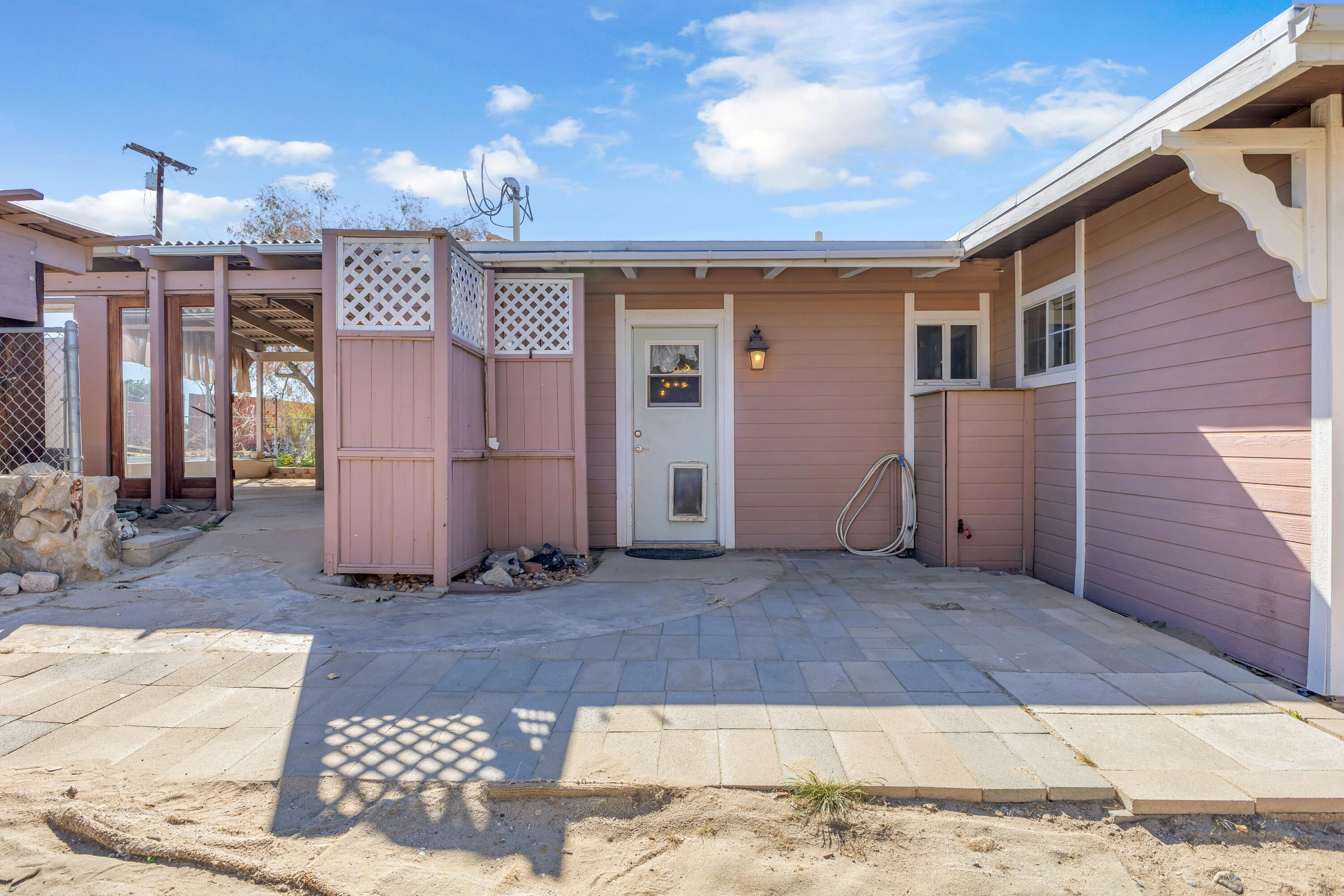 81975 Dillon Road Desert Hot Springs, CA 92241 - Photo 36 of 51 a view of a house with a outdoor space