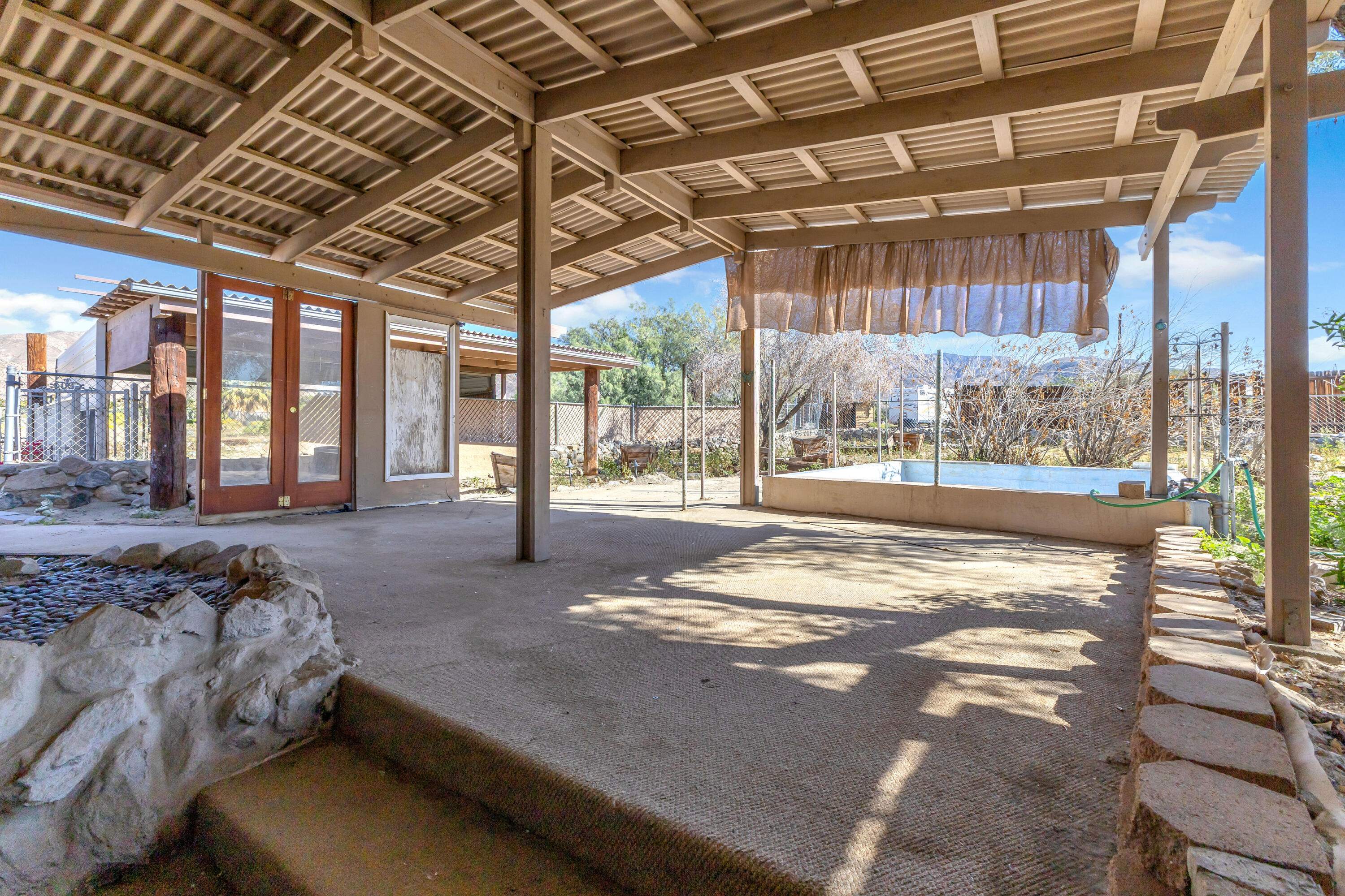 81975 Dillon Road Desert Hot Springs, CA 92241 - Photo 39 of 51 a view of a porch