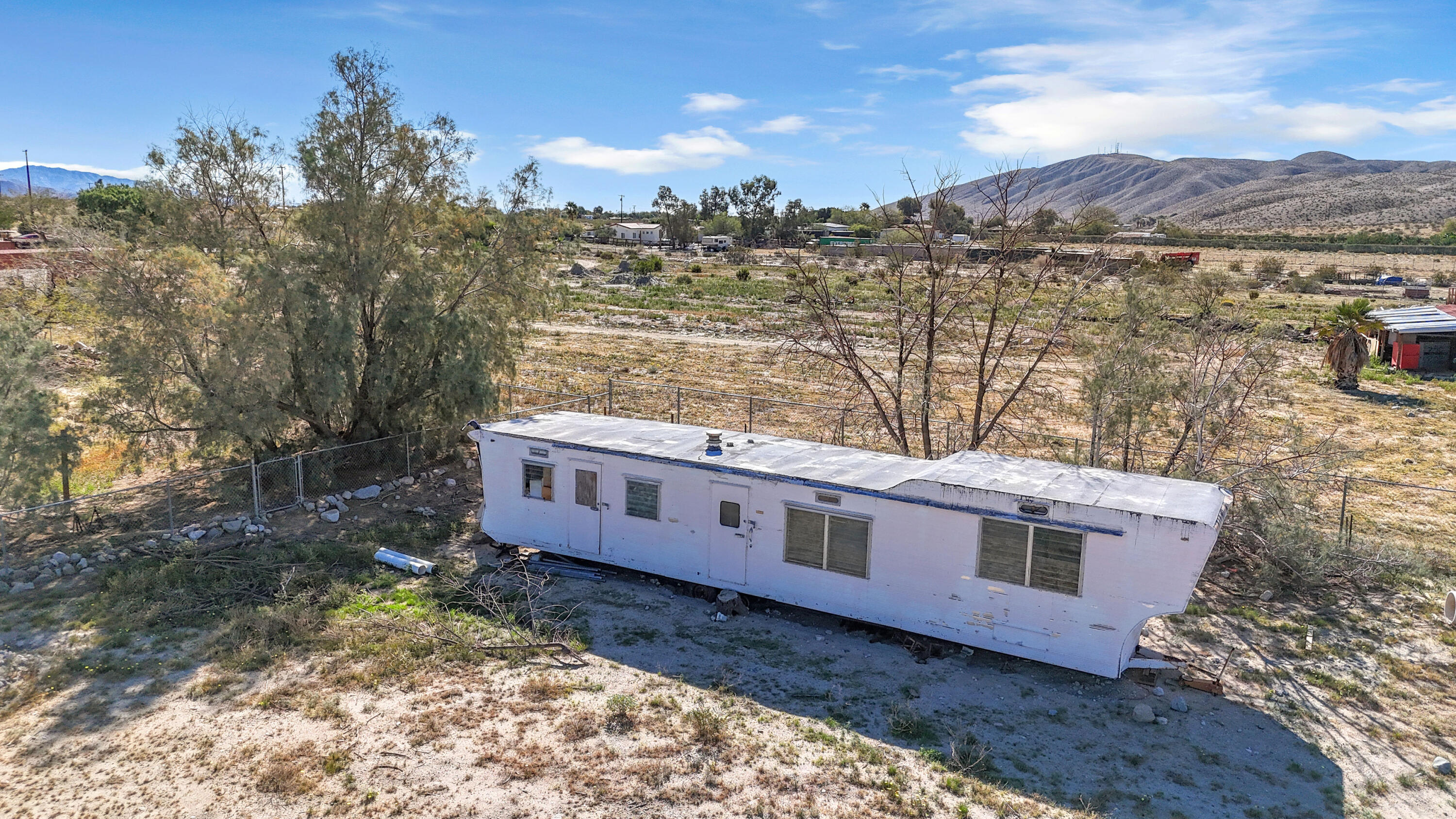 81975 Dillon Road Desert Hot Springs, CA 92241 - Photo 49 of 51 a view of a house with a yard