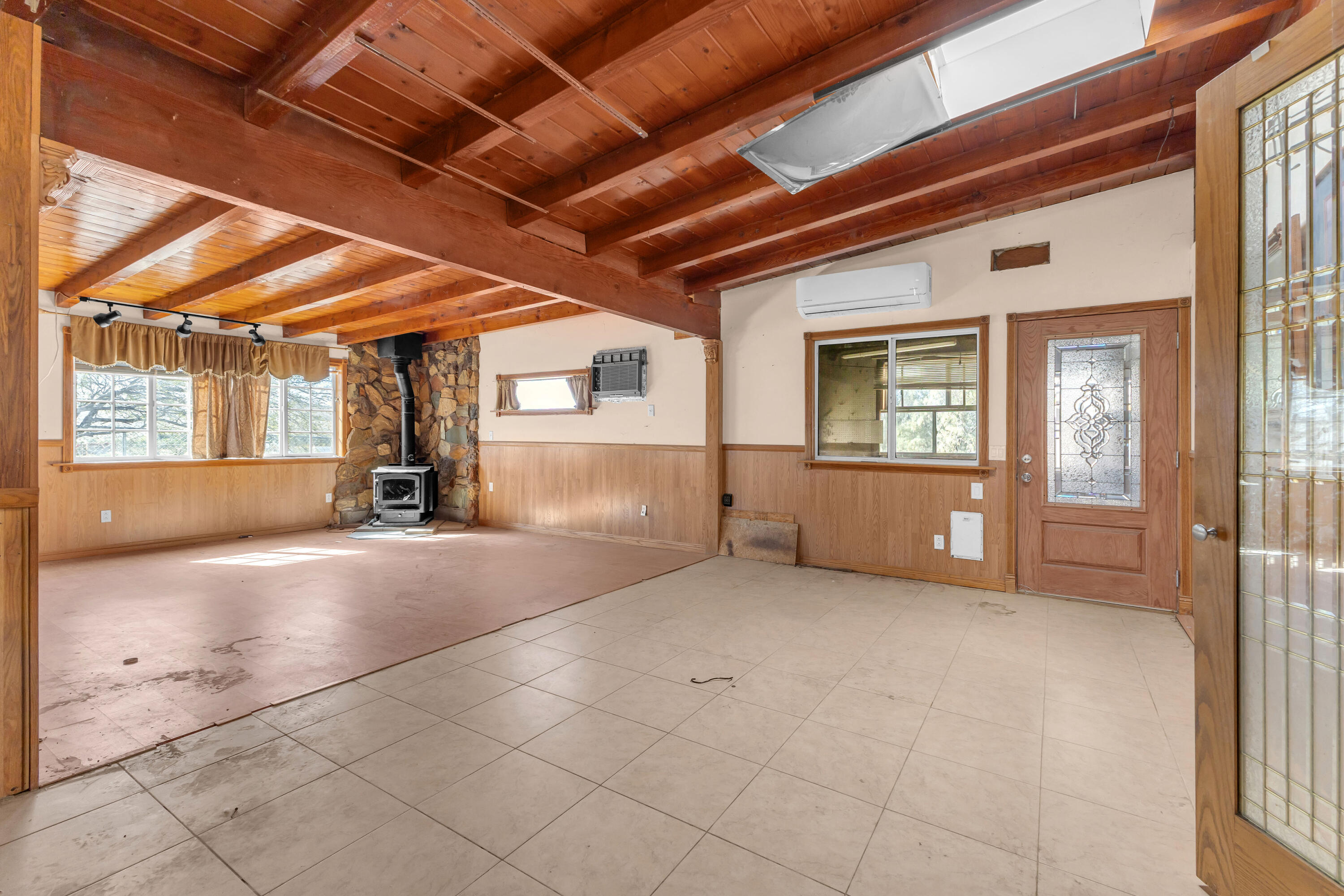 81975 Dillon Road Desert Hot Springs, CA 92241 - Photo 10 of 51 a view of an empty room with a window