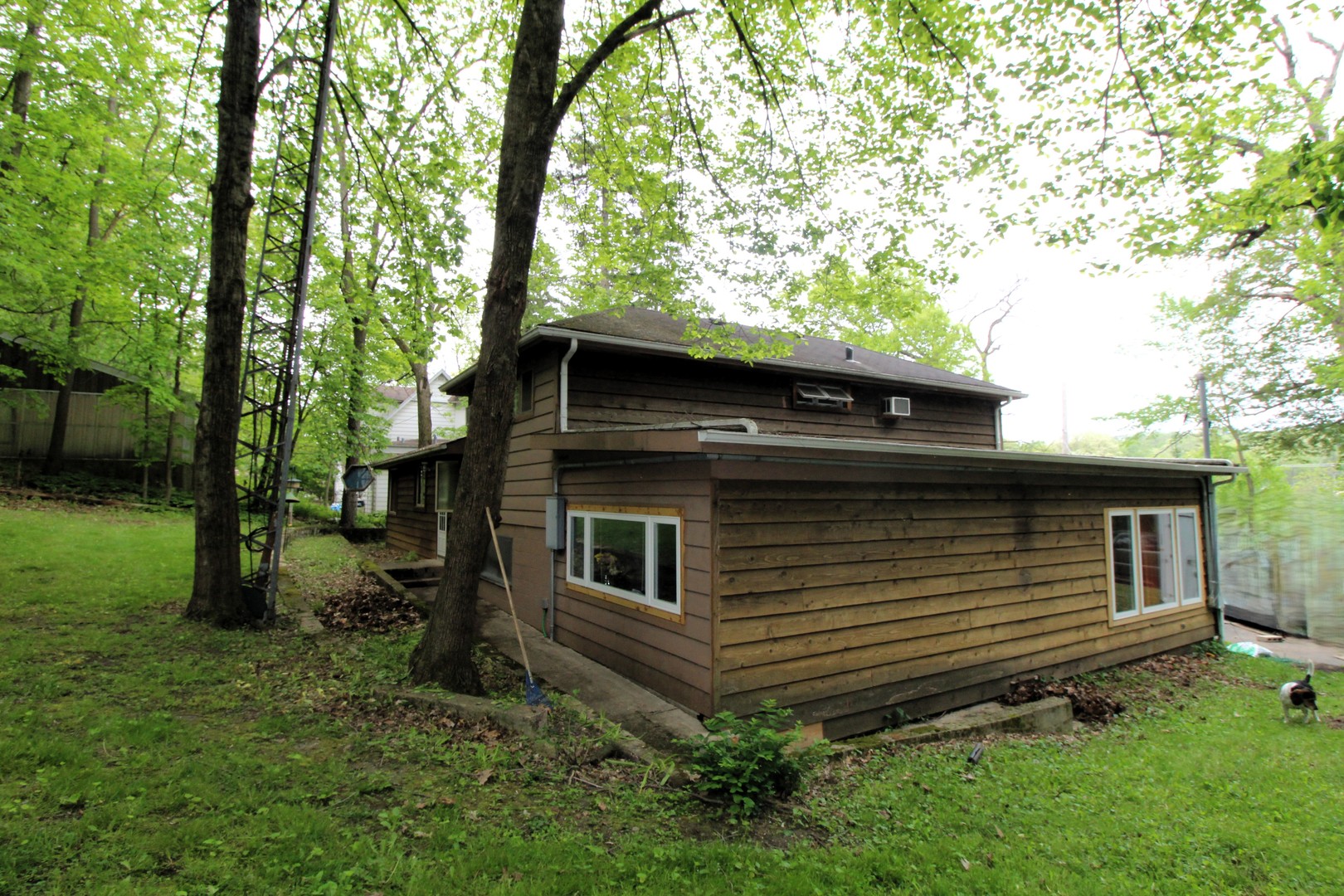 1843 North River Road Algonquin, IL 60102 - Photo 2 of 13 a front view of a house with garden