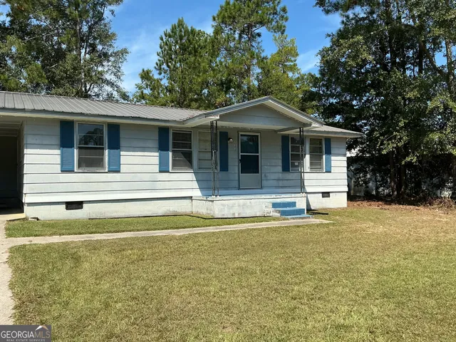 a view of a house with a swimming pool