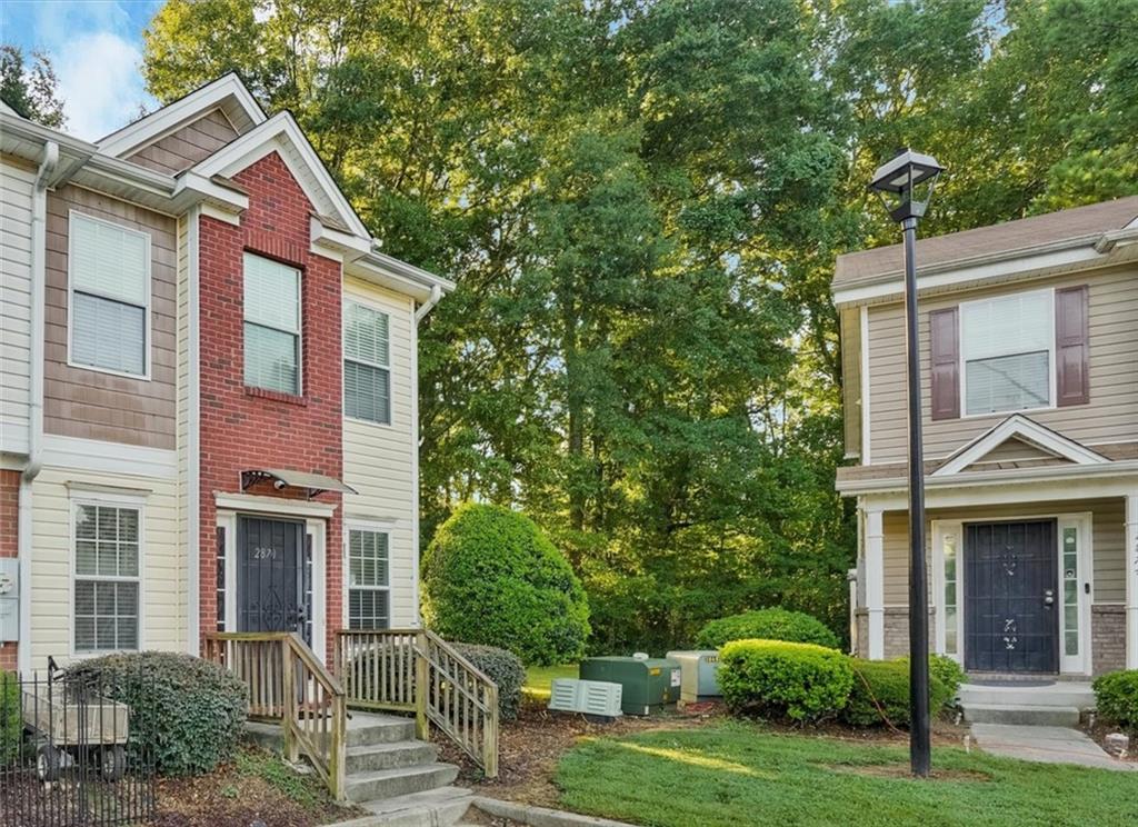 2870 Vining Ridge Terrace Decatur, GA 30034 - Photo 2 of 23 a front view of a house with garden