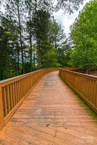 a view of balcony with wooden floor