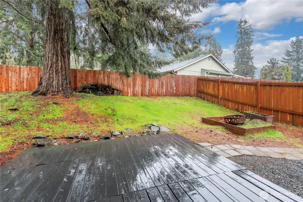 a view of backyard with wooden floor