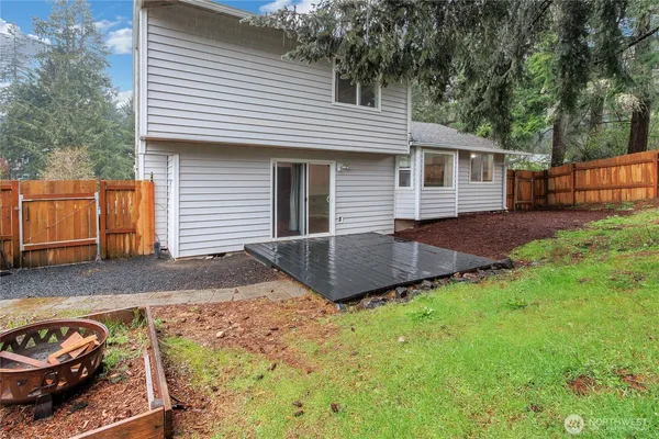 a view of a backyard with a garden