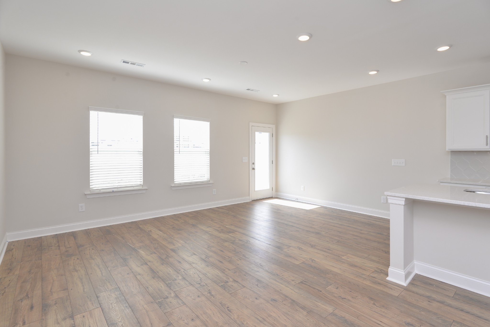 5718 Dockside Rockvale, TN 37153 - Photo 5 of 13 a view of an empty room with wooden floor and a window