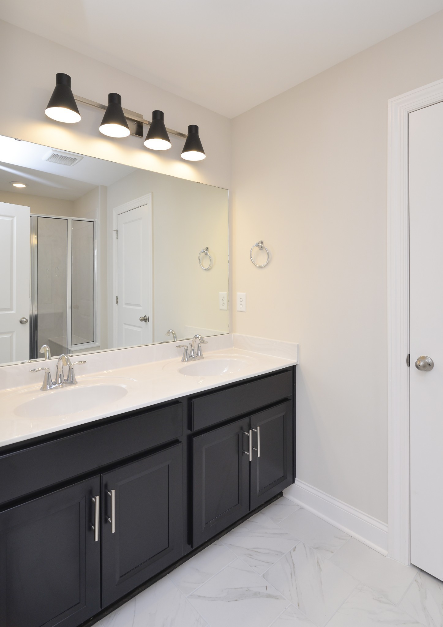 5718 Dockside Rockvale, TN 37153 - Photo 7 of 13 a bathroom with a double vanity sink and mirror