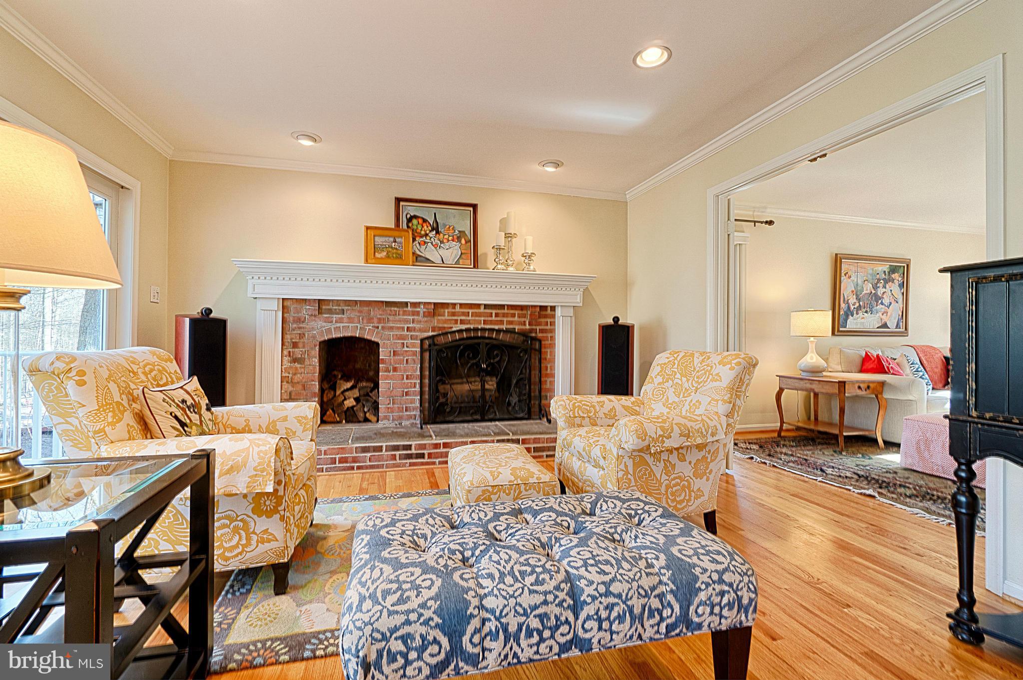 11008 Raccoon Ridge Court Reston, VA 20191 - Photo 14 of 30 a living room with furniture and a fireplace