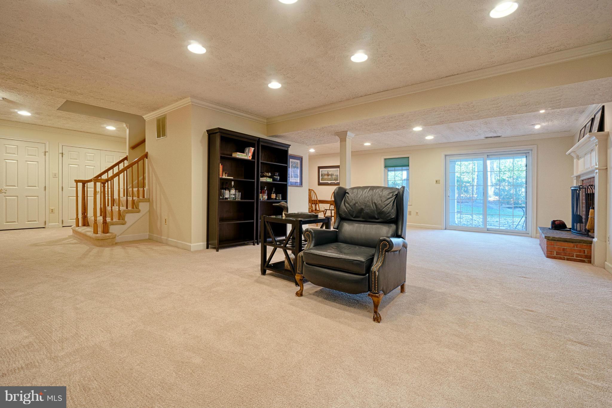 11008 Raccoon Ridge Court Reston, VA 20191 - Photo 29 of 30 a living room with furniture and a flat screen tv