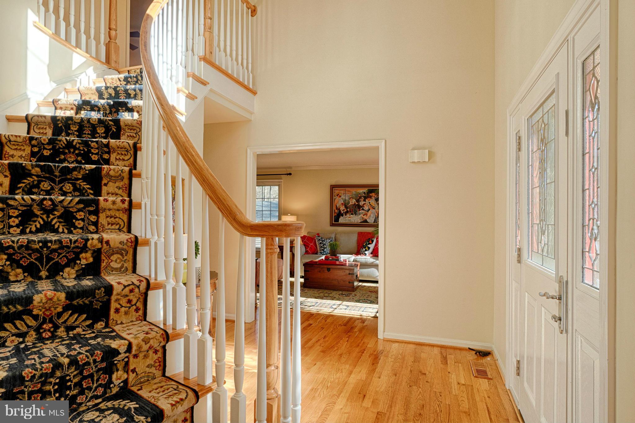 11008 Raccoon Ridge Court Reston, VA 20191 - Photo 6 of 30 a view of entryway with wooden floor