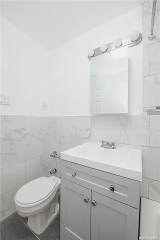 a bathroom with a sink and shower