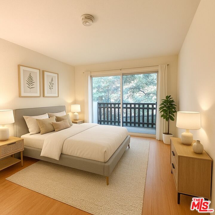 2 Panoramic Way, Unit 302 Berkeley, CA 94704 - Photo 4 of 16 a bedroom with a bed and a large window