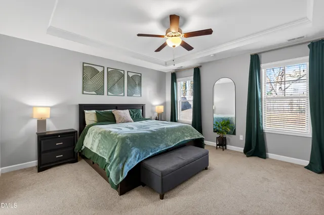 a bathroom with a tub shower and sink