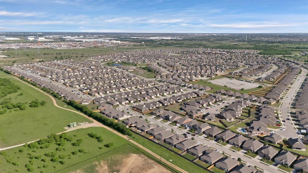 621 Ridgeback Trail Fort Worth, TX 76052 - Photo 21 of 22 Expansive residential development featuring numerous single-story homes with consistent architectural styles