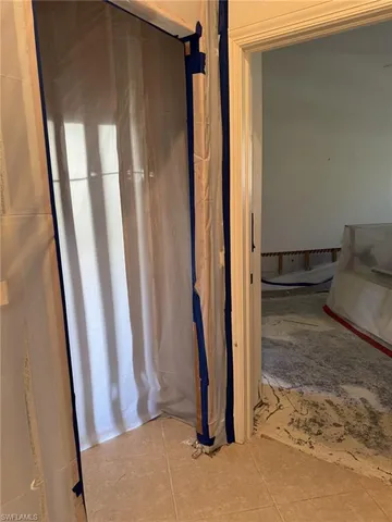 a view of a living room and utility room