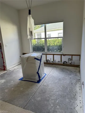 a kitchen with cabinets and a sink