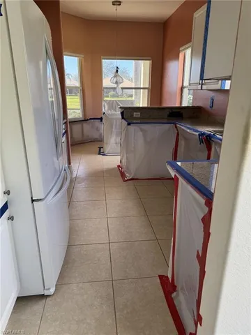 a view of a livingroom with furniture window and wooden floor