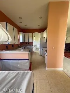 an aerial view of a house with a lake view