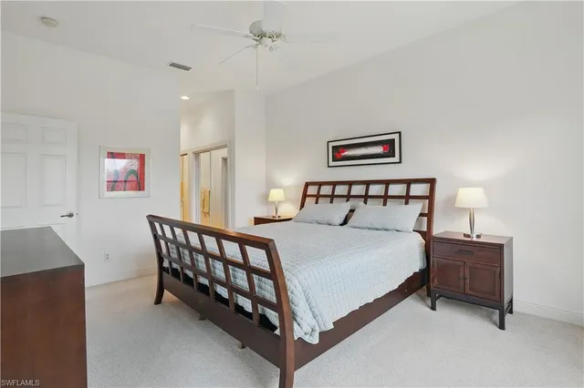 a bathroom with a sink a large mirror and a bathtub