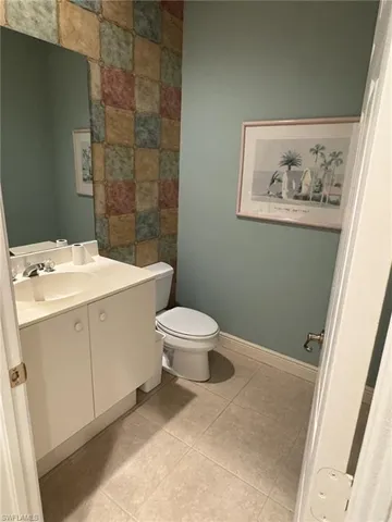 a view of an empty room and a window