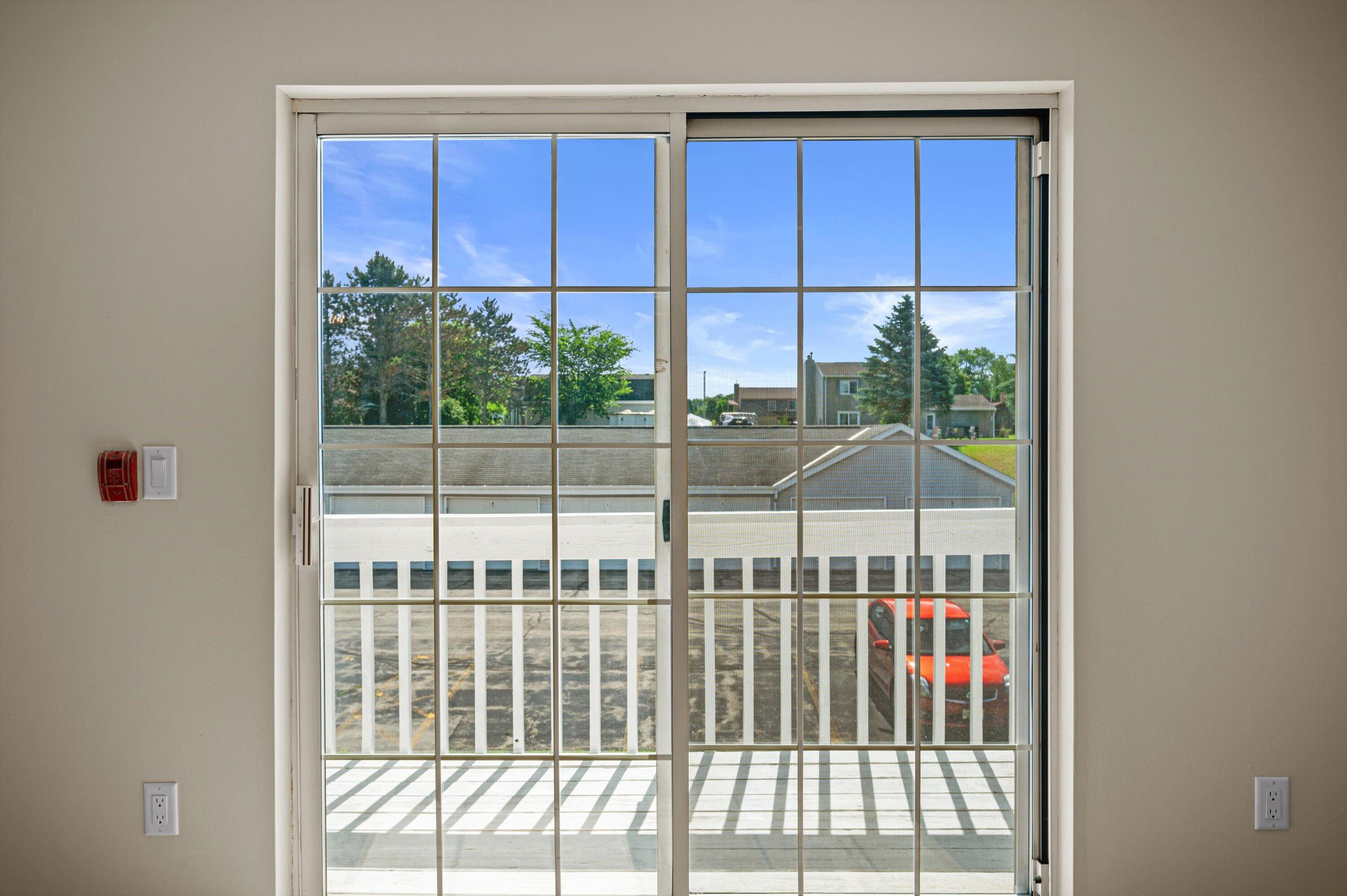 1848 Division Street, Unit 8 East Troy, WI 53120 - Photo 6 of 24 06-Patio Doors to Balcony_Deck