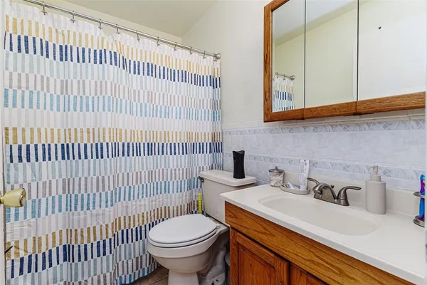 a bathroom with a sink and a toilet
