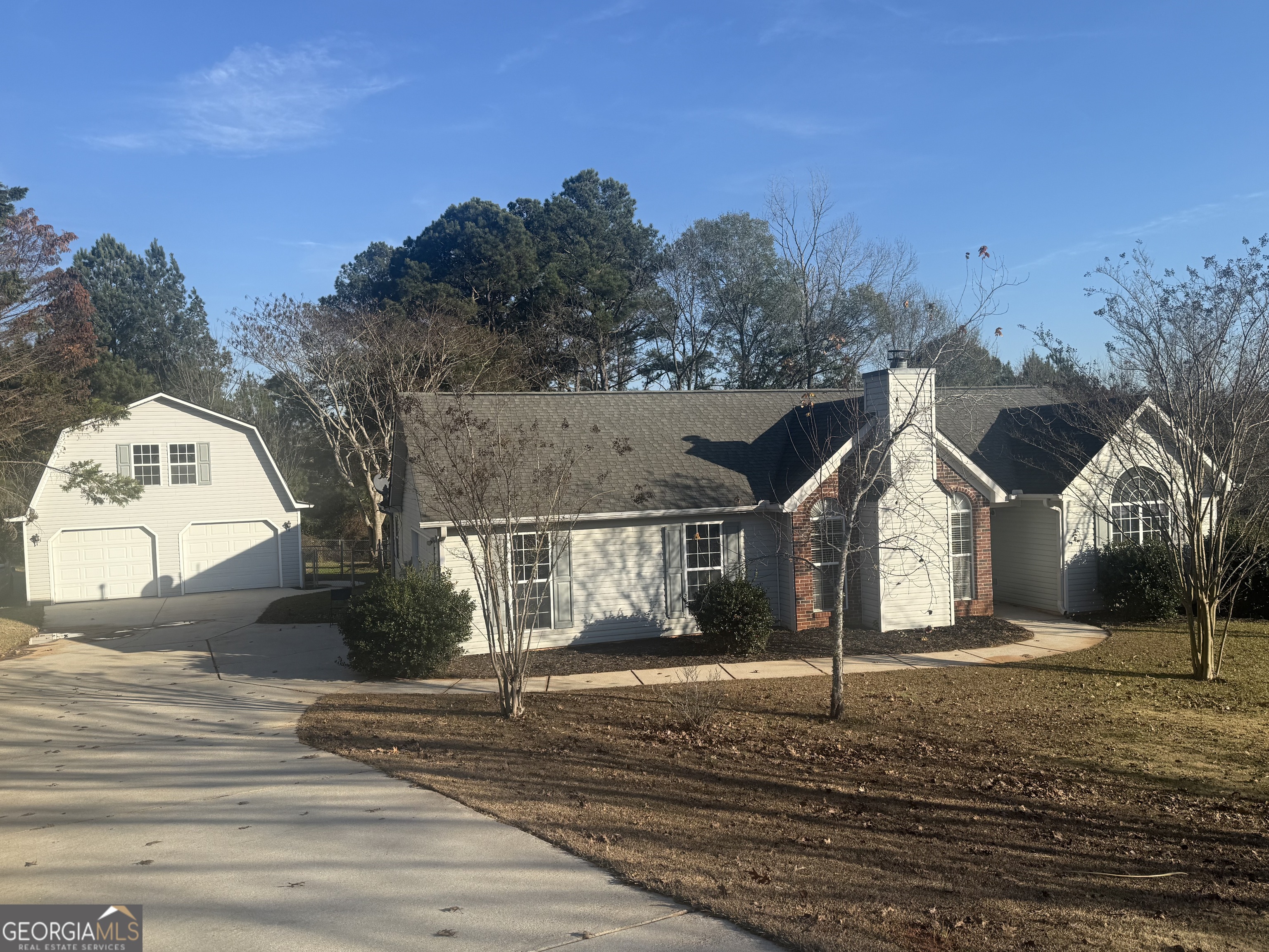 340 Harris Avenue Locust Grove, GA 30248 - Photo 1 of 24 a view of a house next to a yard