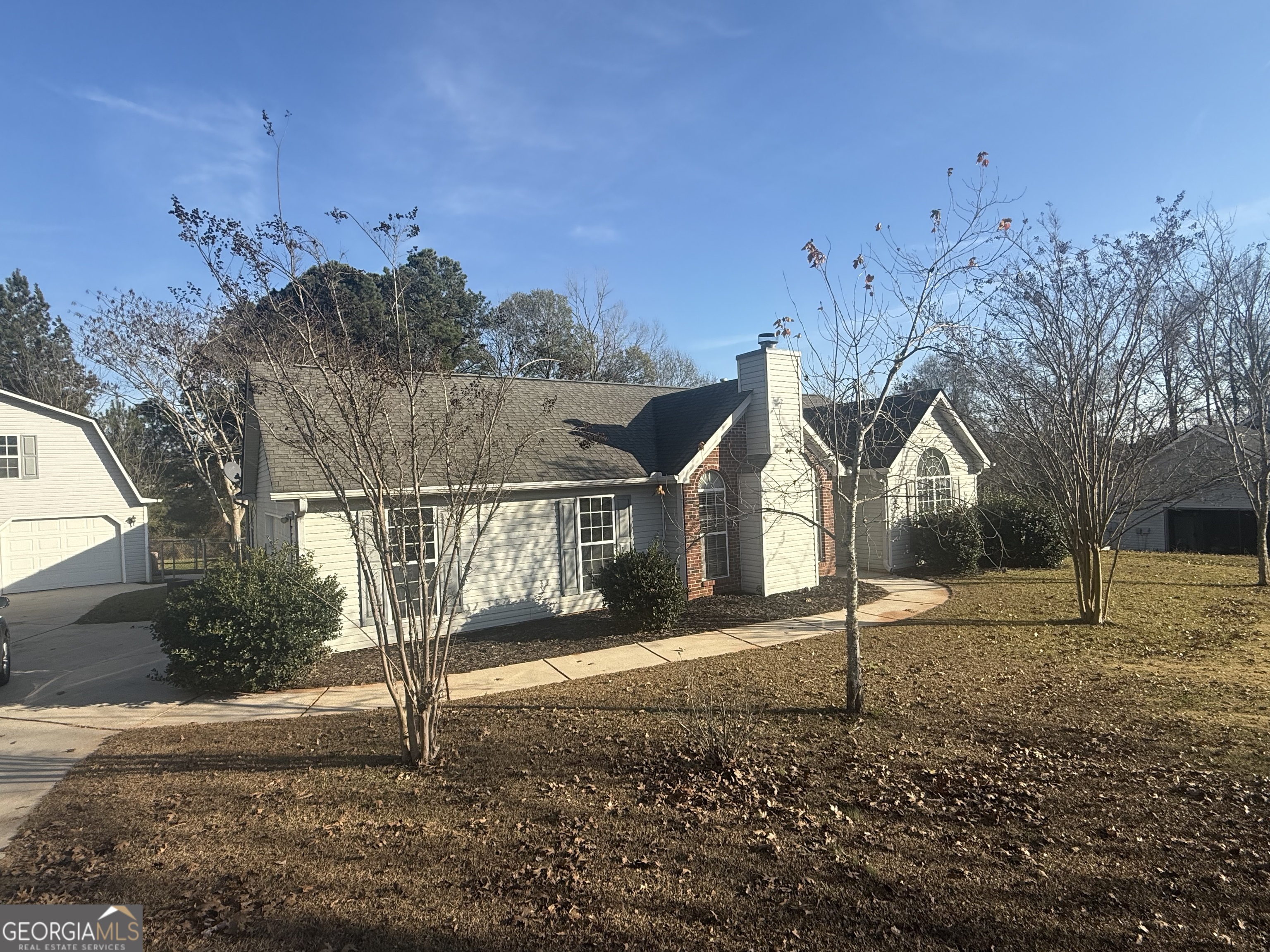 340 Harris Avenue Locust Grove, GA 30248 - Photo 24 of 24 a front view of a house with a yard