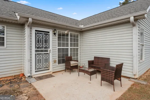 an aerial view of residential houses with outdoor space