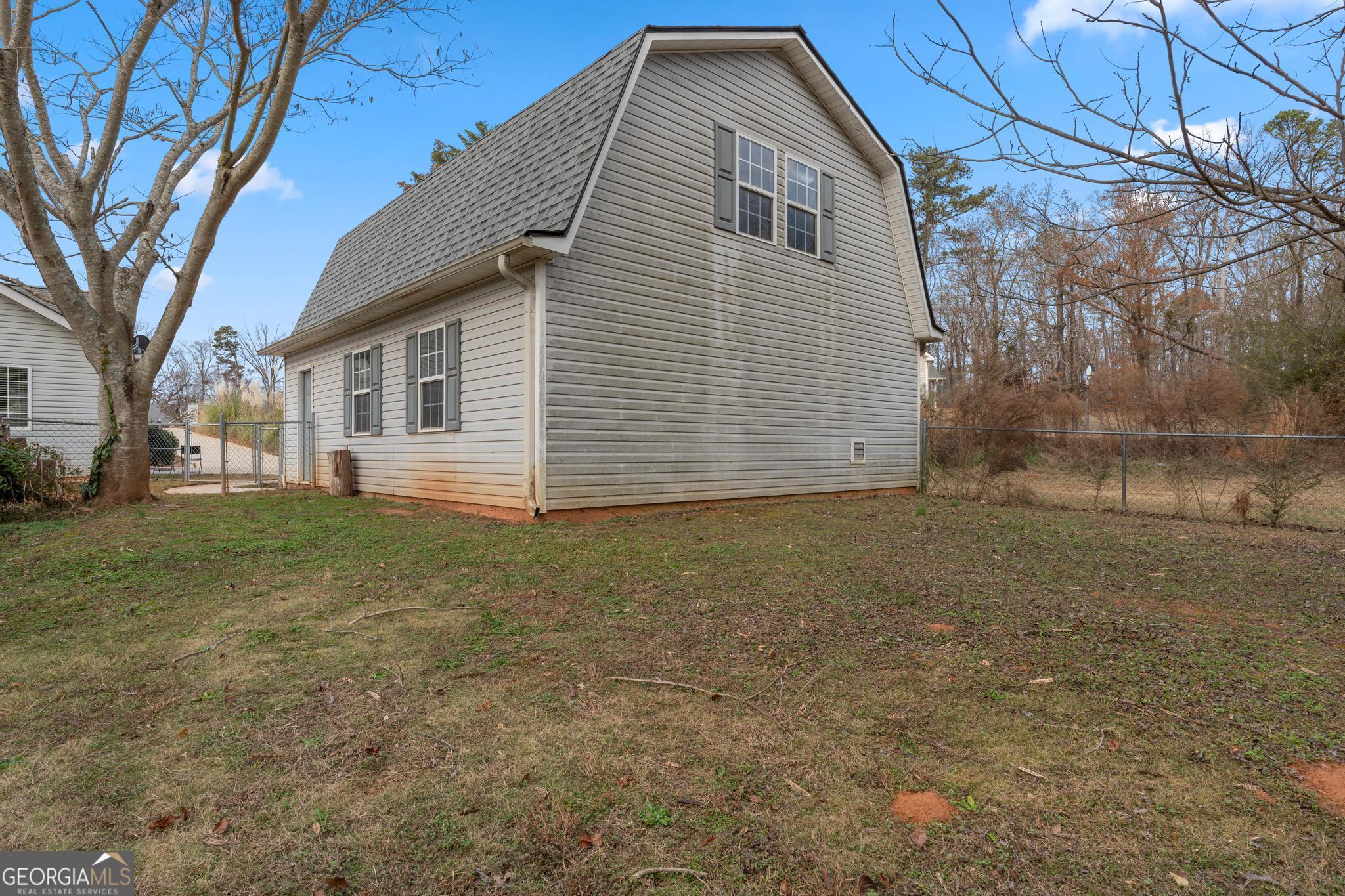 340 Harris Avenue Locust Grove, GA 30248 - Photo 38 of 41 a view of a house with a yard