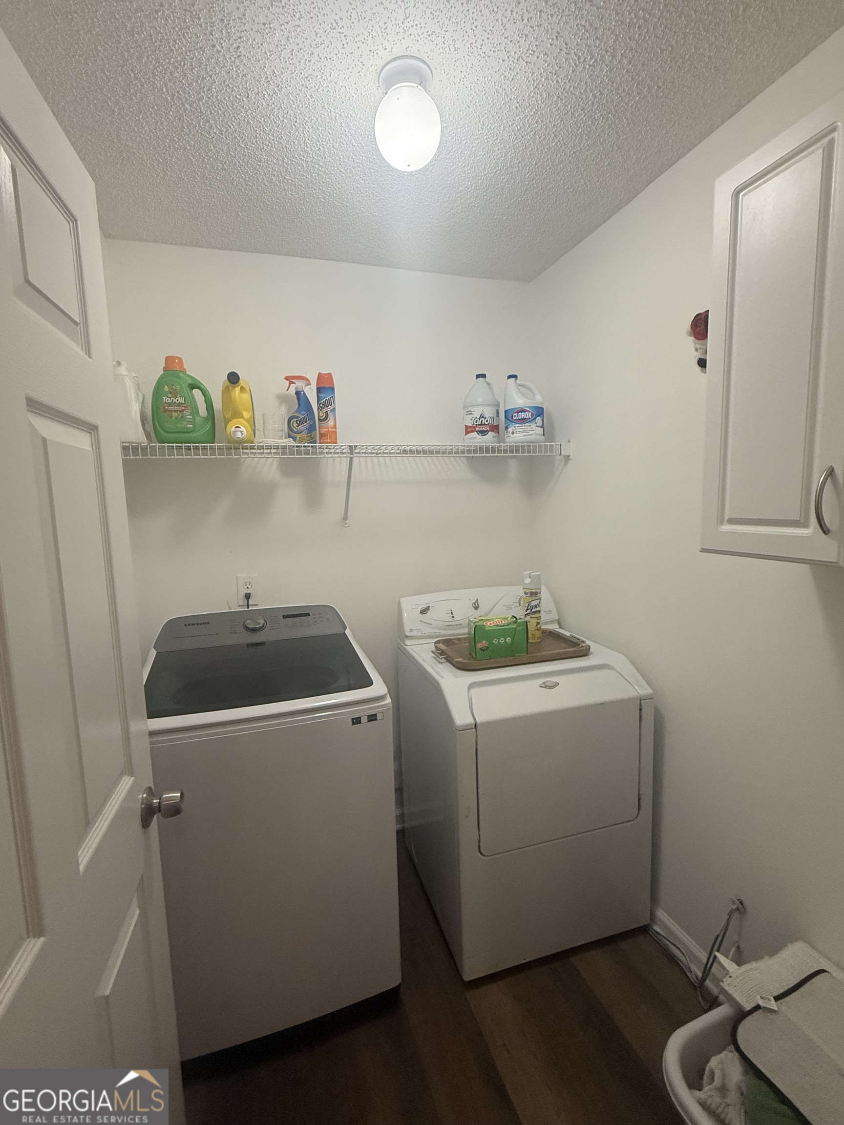 340 Harris Avenue Locust Grove, GA 30248 - Photo 7 of 24 a utility room with dryer and washer