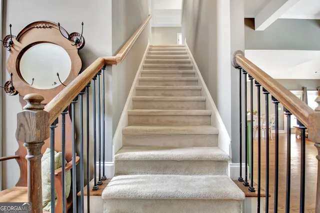 a bedroom with a bed and a view of bathroom