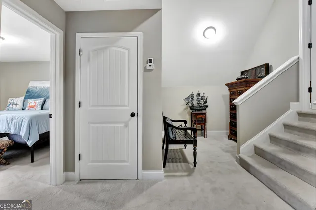 a bathroom with a toilet and shower